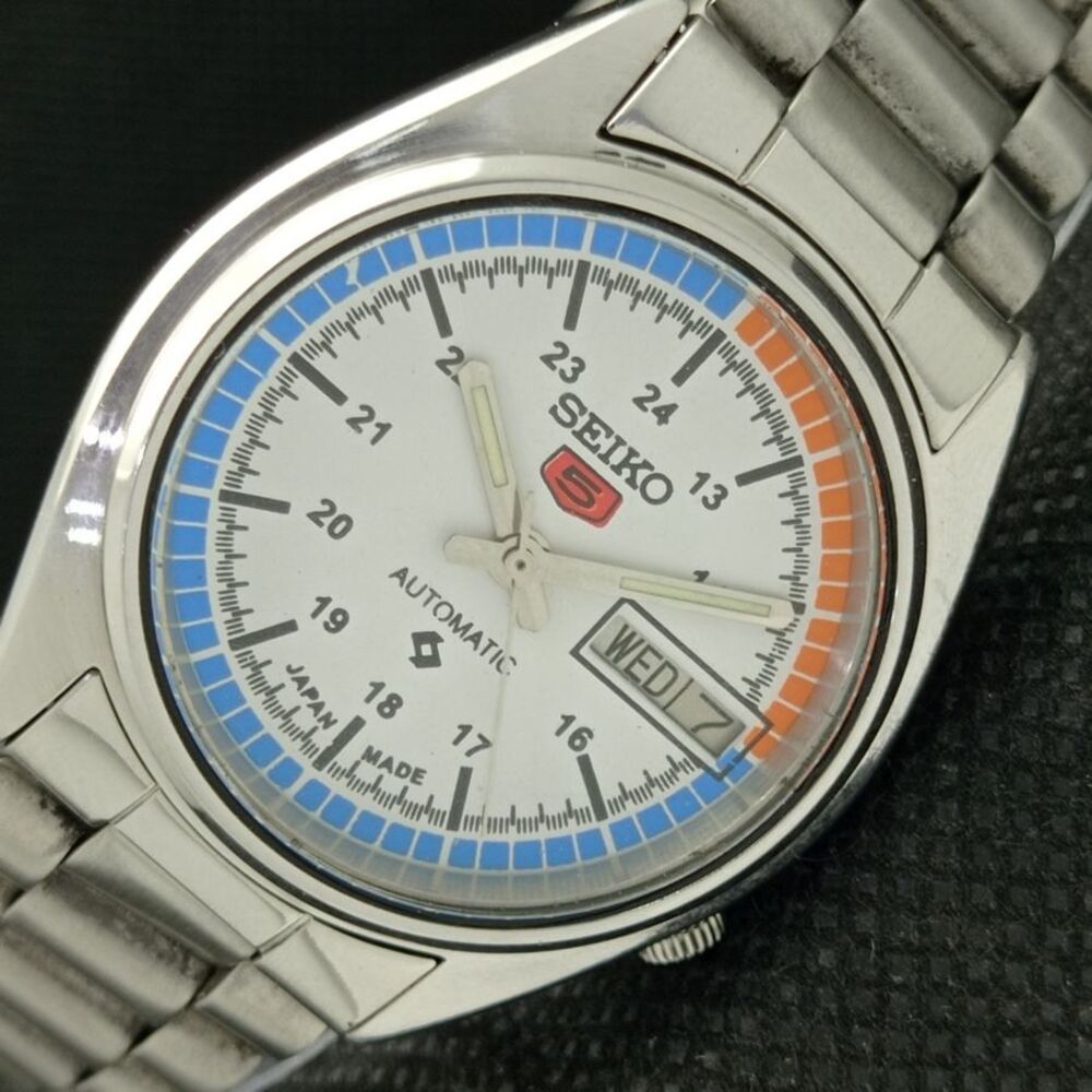 Seiko Silver Watch with Blue and Orange Accents